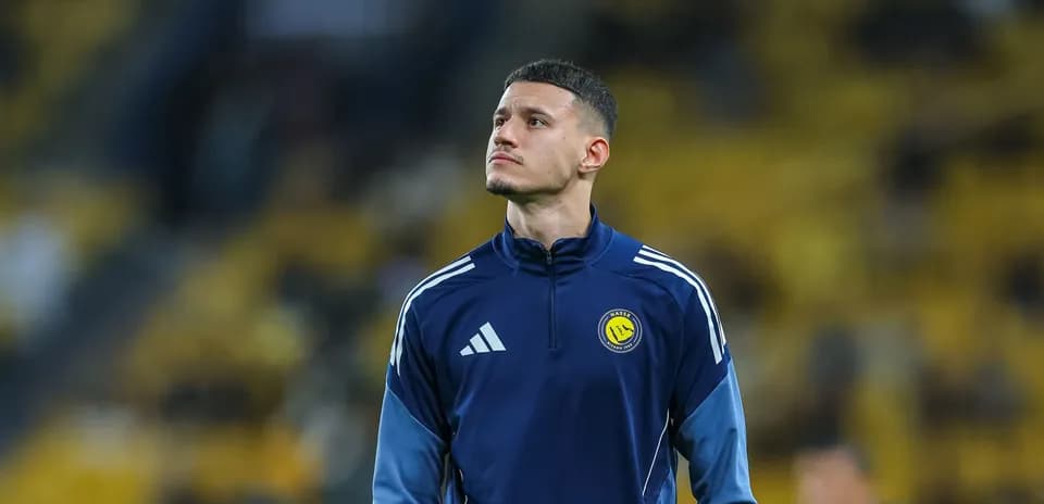 Jugador de fútbol en calentamiento antes del partido
