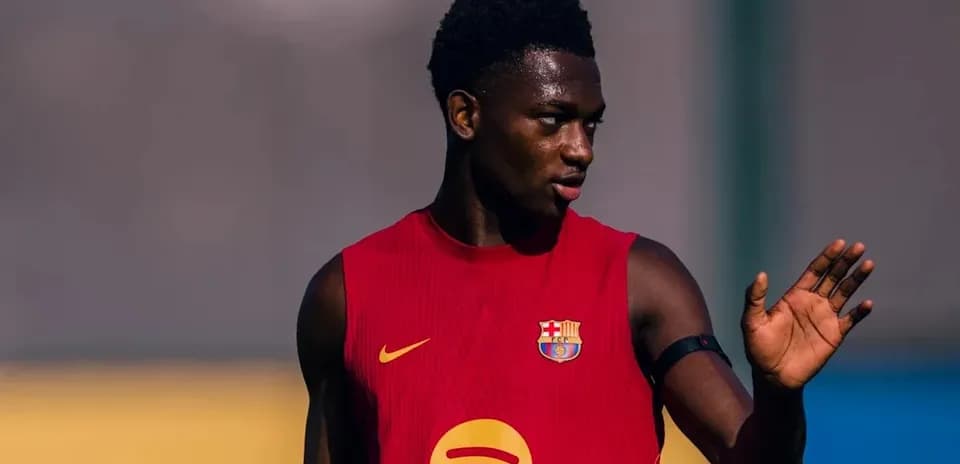 Jugador de FC Barcelona entrenando en campo