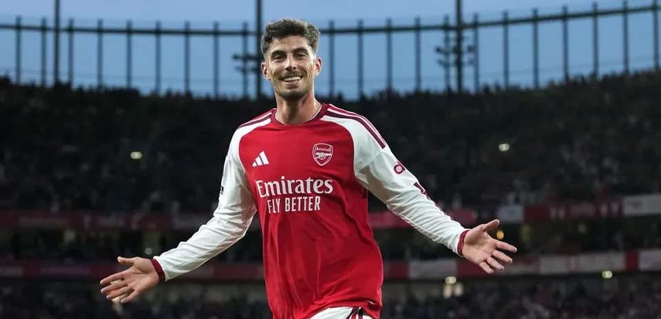 Jugador de Arsenal celebrando un gol en el estadio