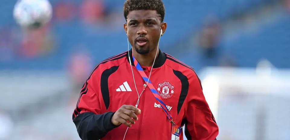 Jugador de Manchester United en calentamiento antes del partido