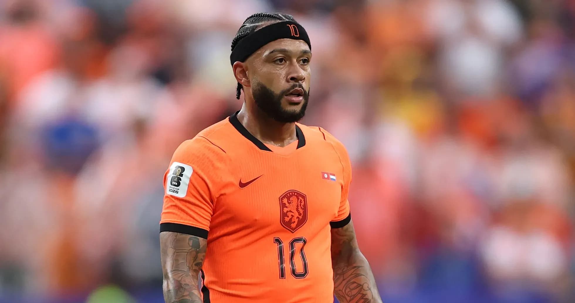 Jugador de Países Bajos en camiseta naranja durante partido