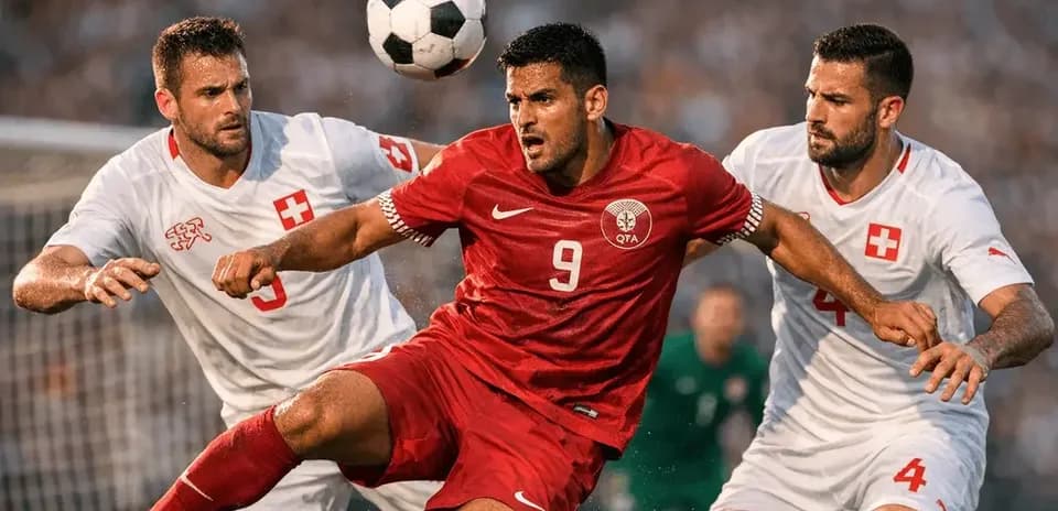 Jugador de Qatar luchando por el balón contra Suiza