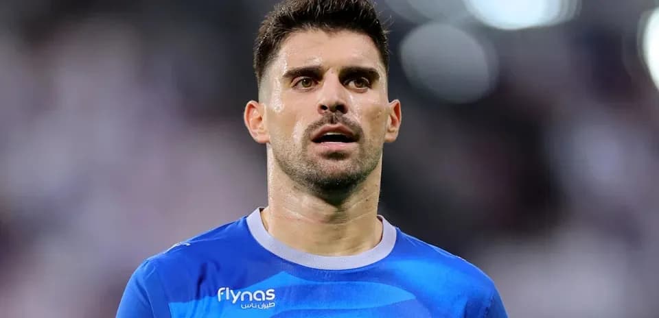 Jugador con camiseta azul durante un partido