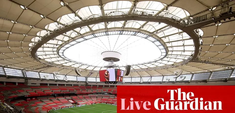 Interior view of a stadium with a large roof