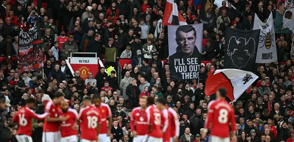 Aficionados de Manchester United en el estadio