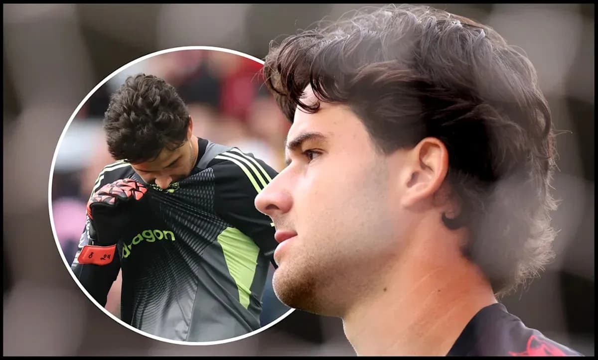 Portero con guantes mirando hacia abajo durante el partido