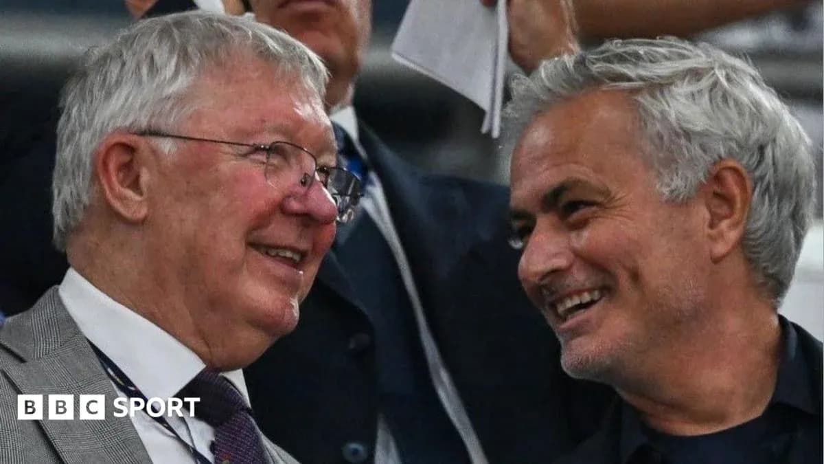 Dos hombres sonriendo en un evento deportivo