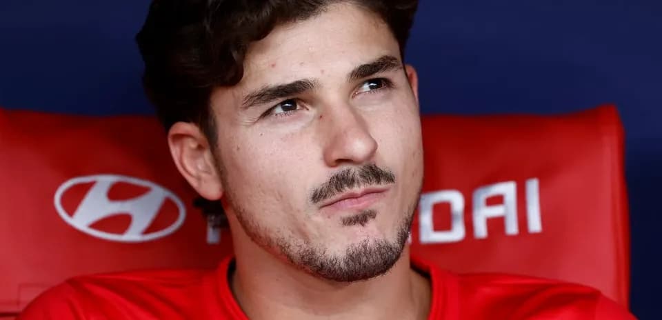 Jugador sentado en el banco de suplentes