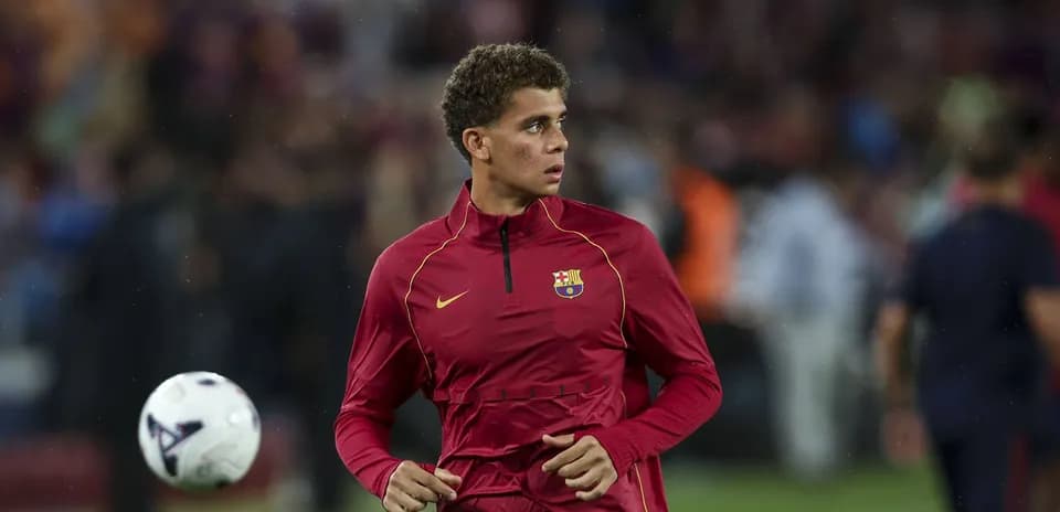 Jugador de FC Barcelona calentando antes del partido