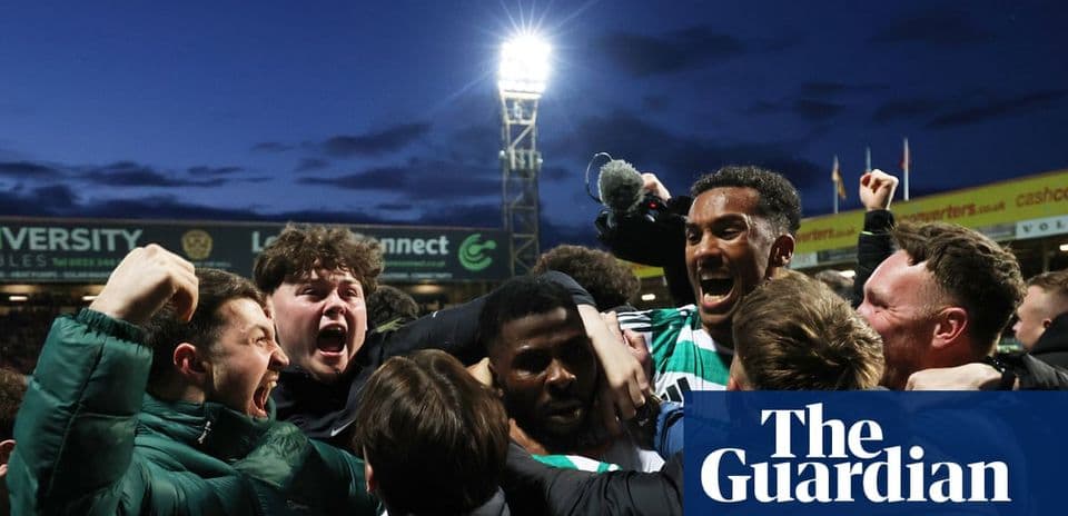 Celebration of players and fans after a goal