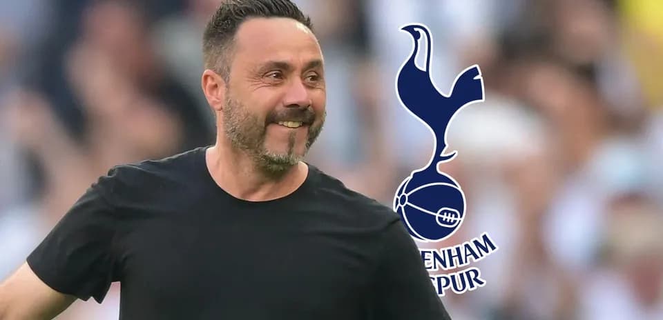 Entrenador de Tottenham sonriendo en el campo