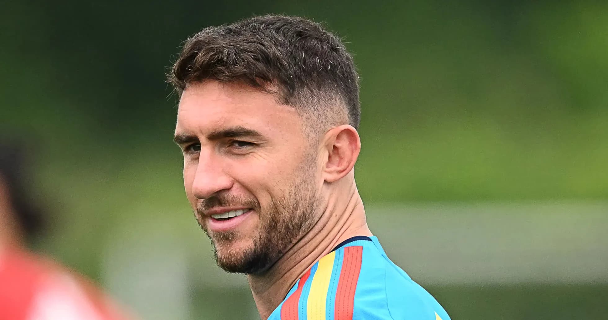 Jugador sonriendo durante una sesión de entrenamiento