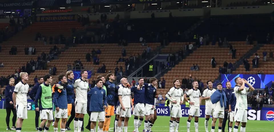 Jugadores celebrando tras un partido de Champions League
