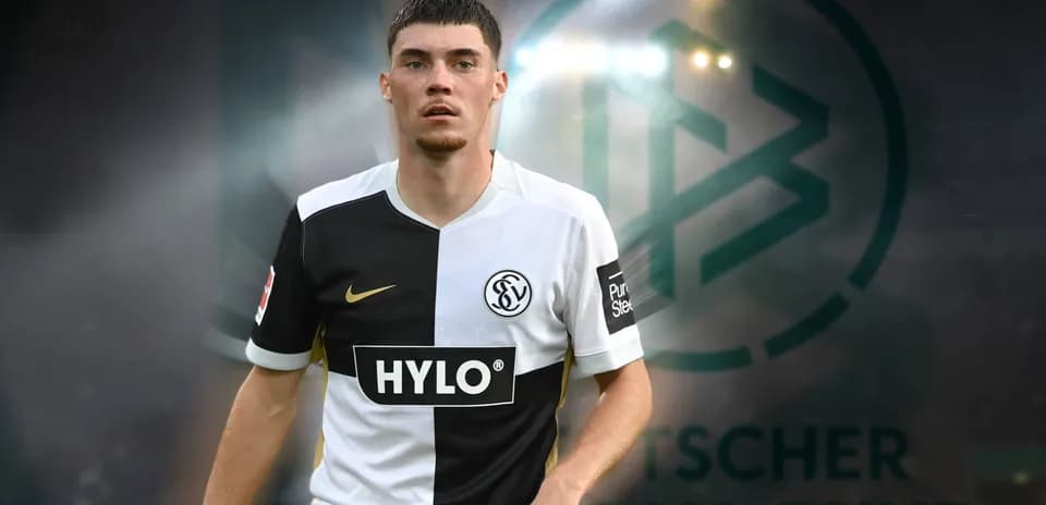 Jugador en uniforme de fútbol frente a fondo difuso