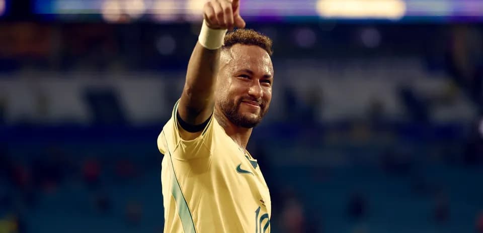 Jugador celebrando con el dedo apuntando hacia arriba