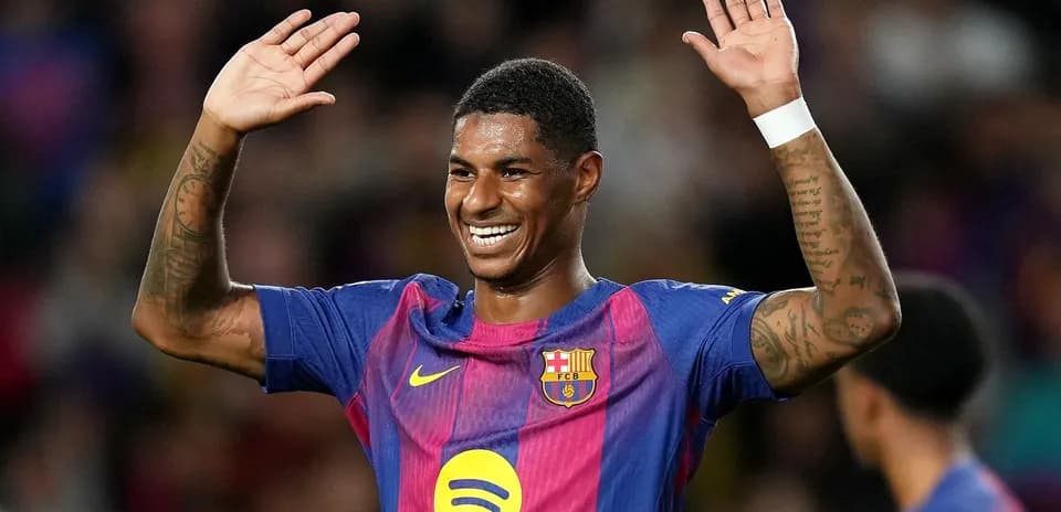 Jugador del FC Barcelona saludando al público