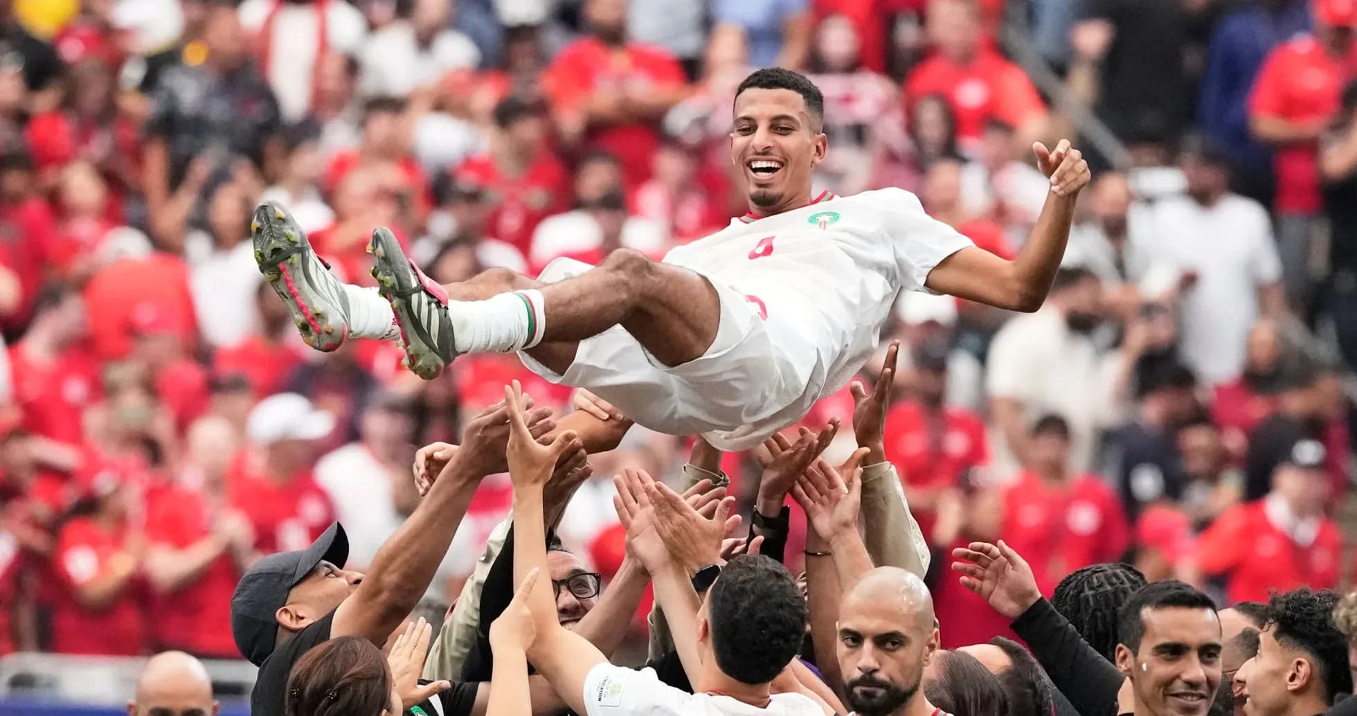 Celebración de jugadores de Marruecos en el estadio