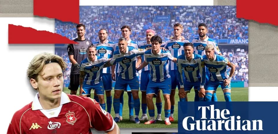 Equipo de fútbol posando en el estadio