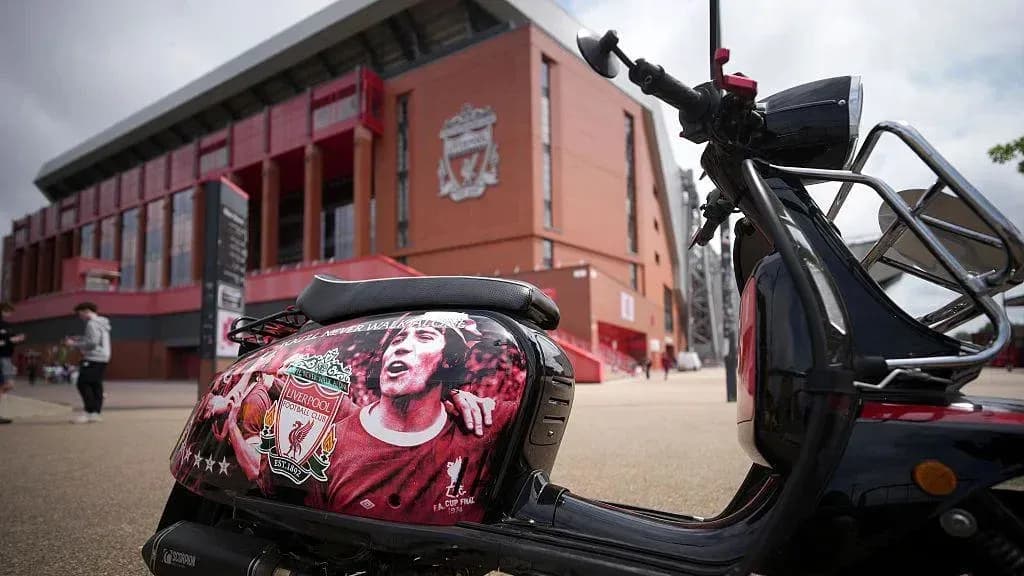 Scooter with Liverpool FC logo outside Anfield Scooter with Liverpool FC logo outside Anfield