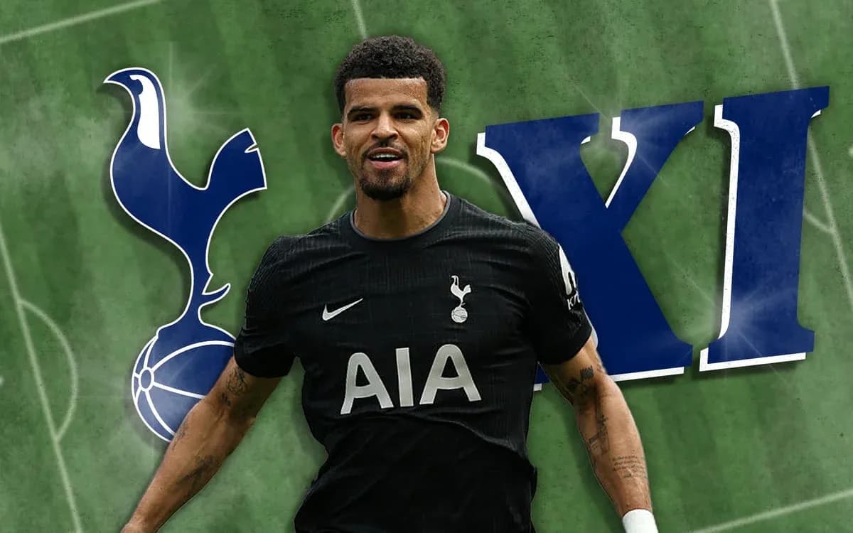 Jugador de Tottenham con uniforme negro sonriendo Jugador de Tottenham con uniforme negro sonriendo