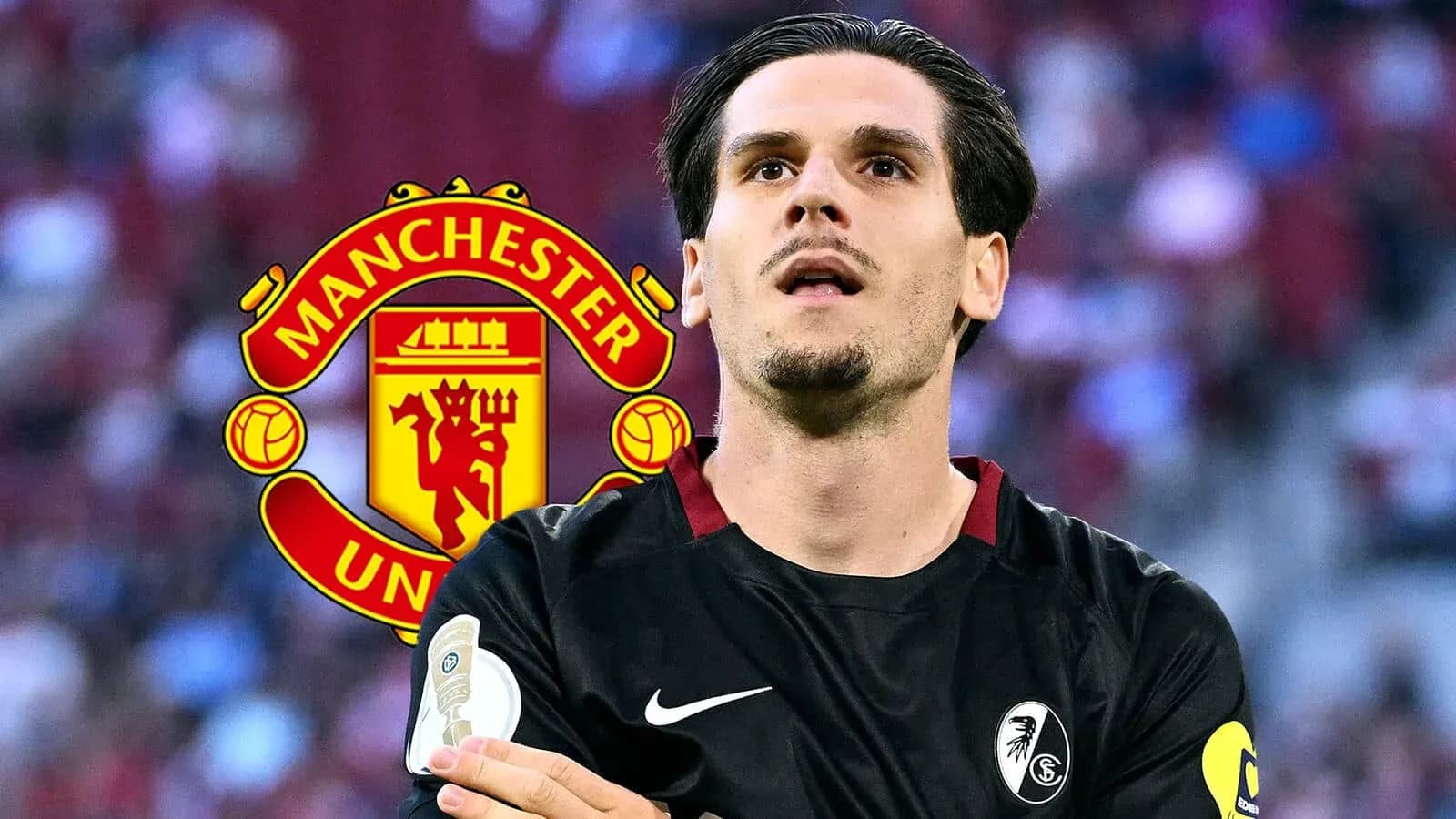 Jugador de Freiburg con logo de Manchester United detrás Jugador de Freiburg con logo de Manchester United detrás