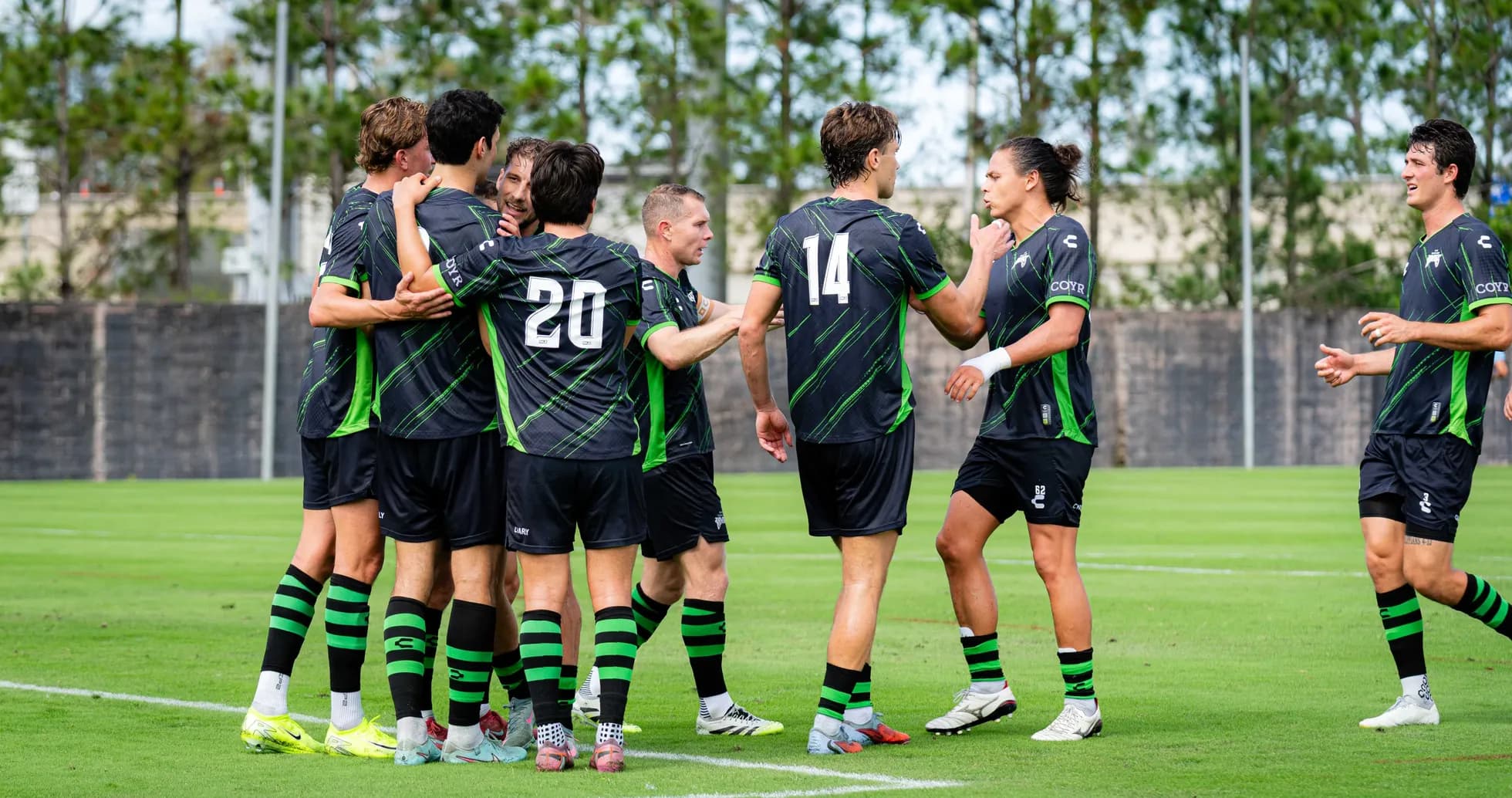 Jugadores de Sporting JAX celebrando un gol Jugadores de Sporting JAX celebrando un gol