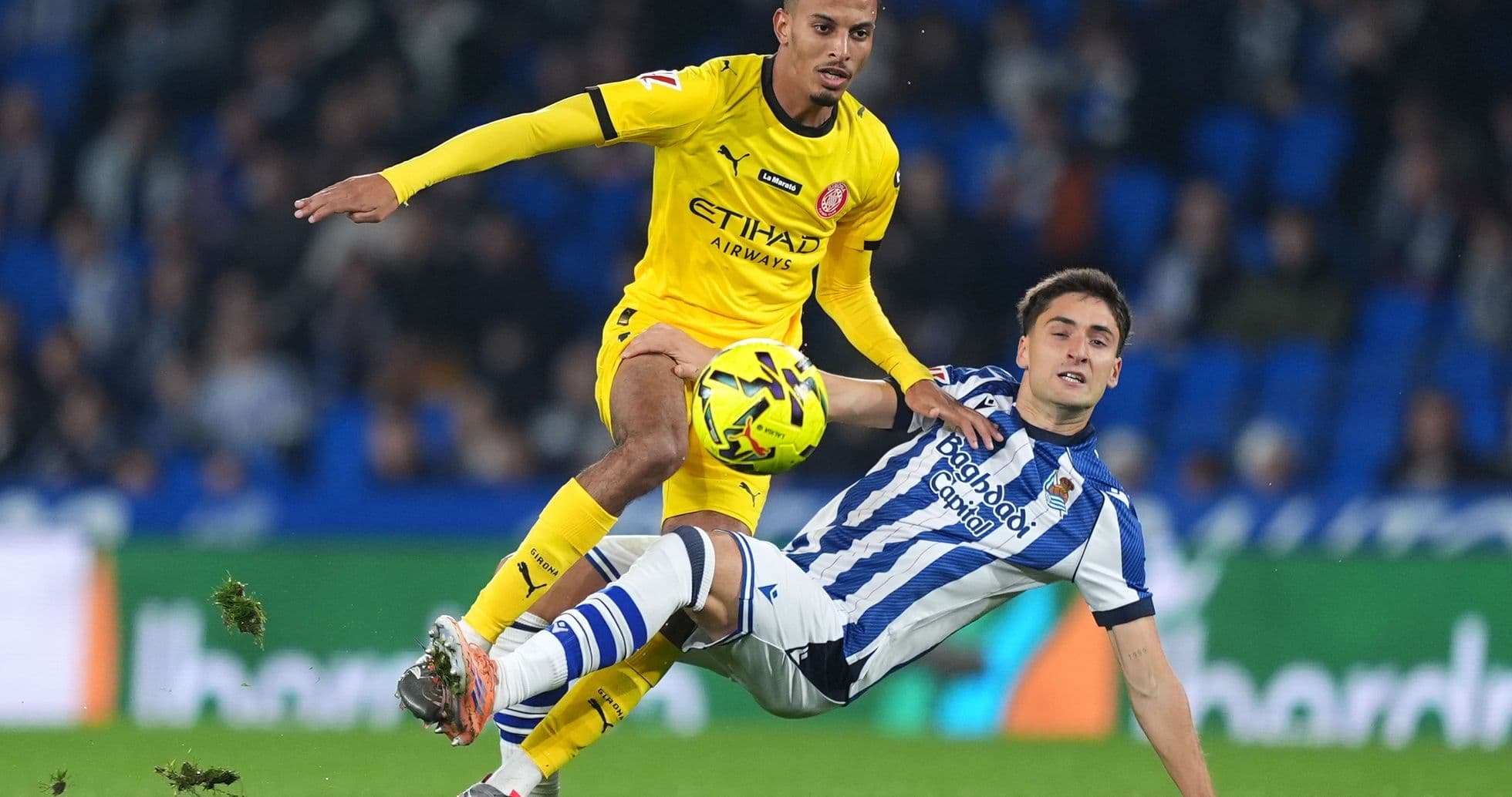 Jugador de Girona en acción contra Real Sociedad Jugador de Girona en acción contra Real Sociedad