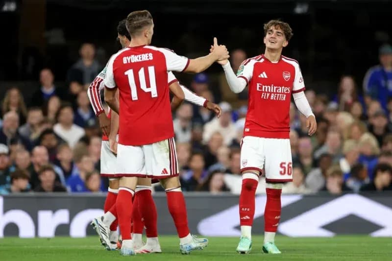 Jugadores de Arsenal celebrando durante un partido Jugadores de Arsenal celebrando durante un partido