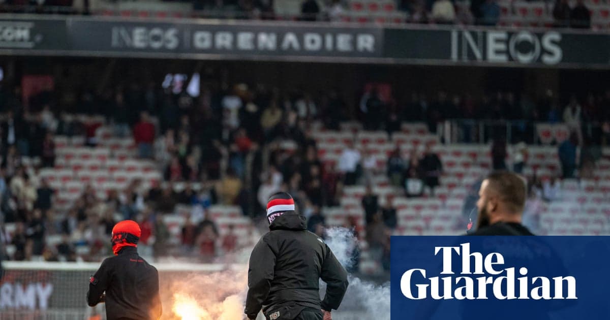 Aflare being lit by fans in stadium Aflare being lit by fans in stadium