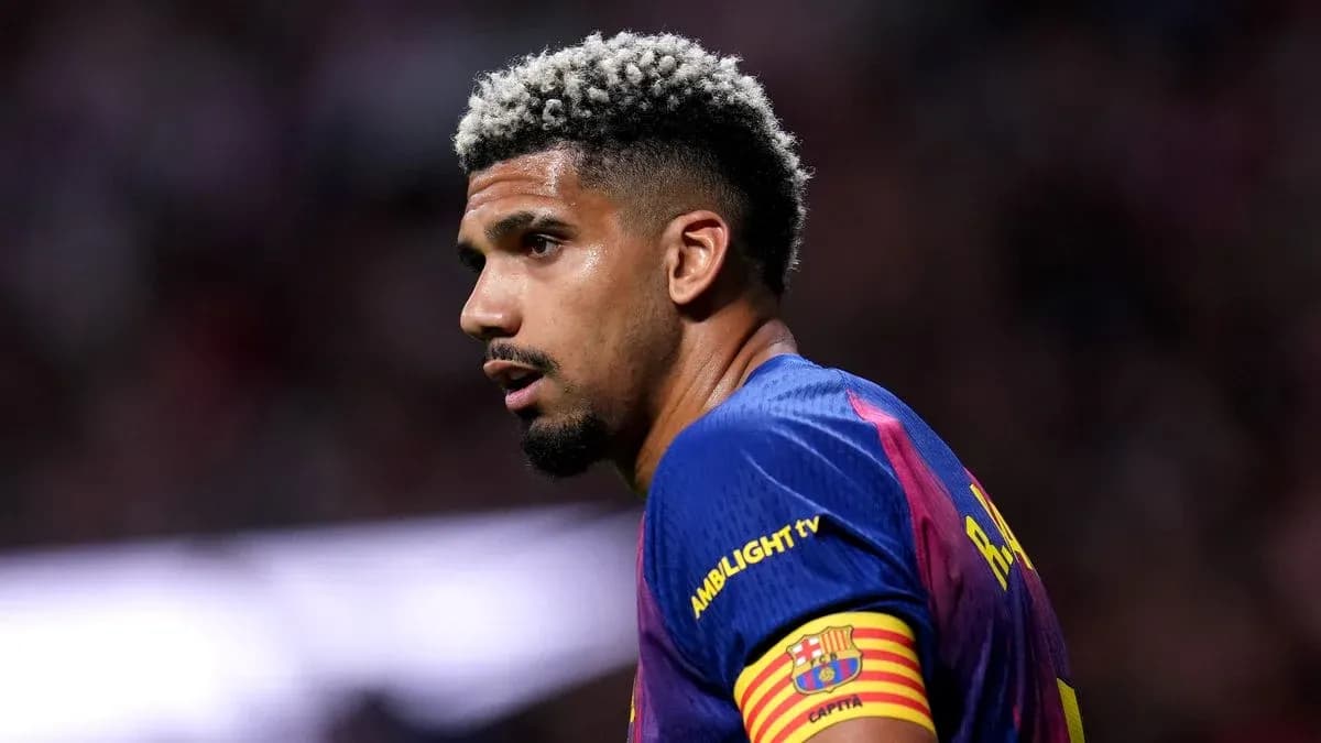 Jugador de fútbol con camiseta del FC Barcelona Jugador de fútbol con camiseta del FC Barcelona
