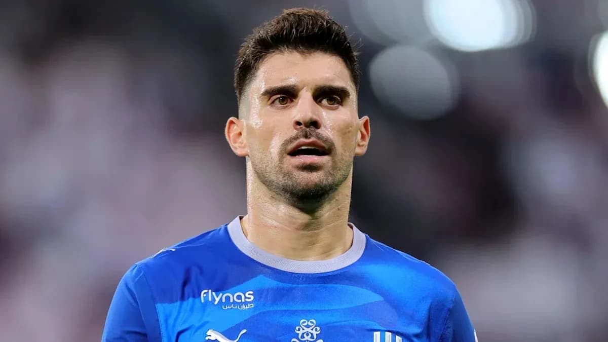 Jugador con camiseta azul durante un partido Jugador con camiseta azul durante un partido
