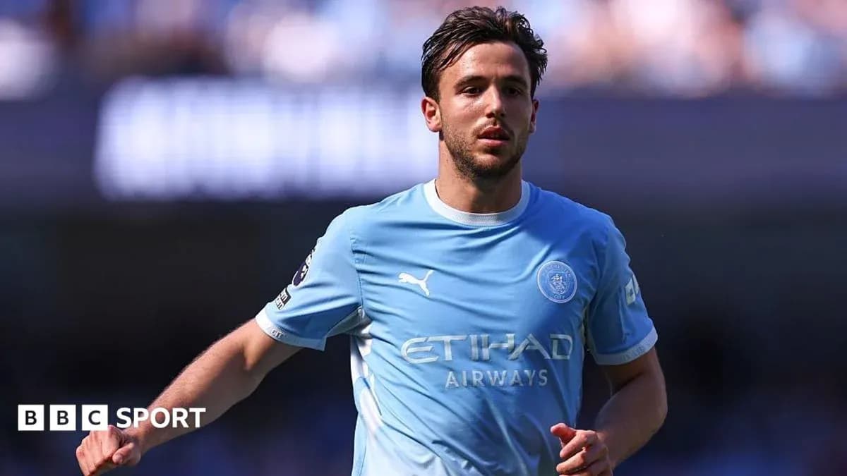 Jugador de Manchester City en el campo durante partido Jugador de Manchester City en el campo durante partido