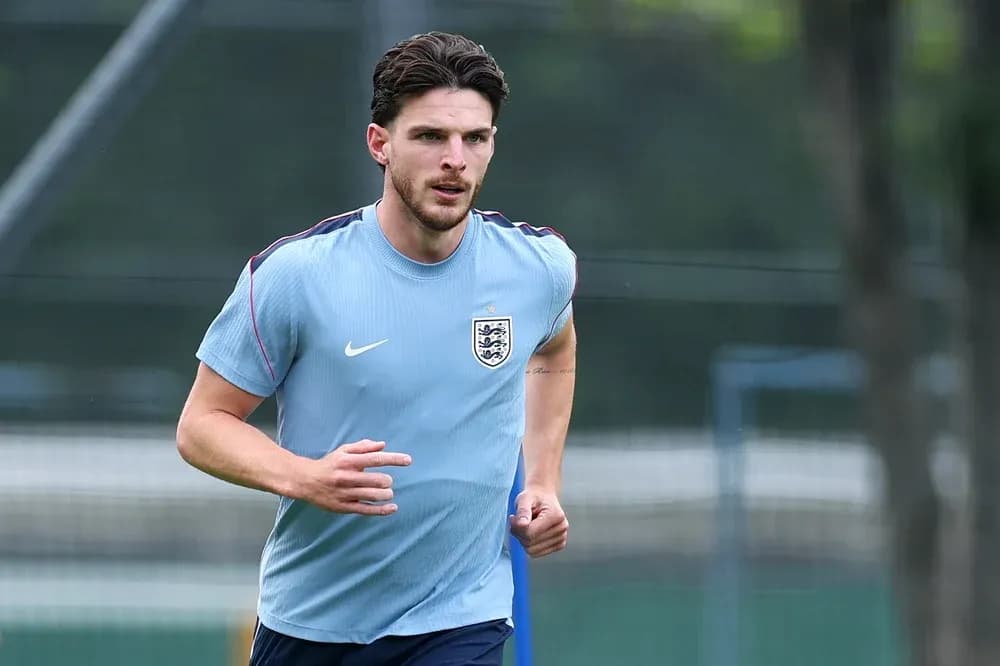 Jugador de Inglaterra corriendo durante entrenamiento Jugador de Inglaterra corriendo durante entrenamiento