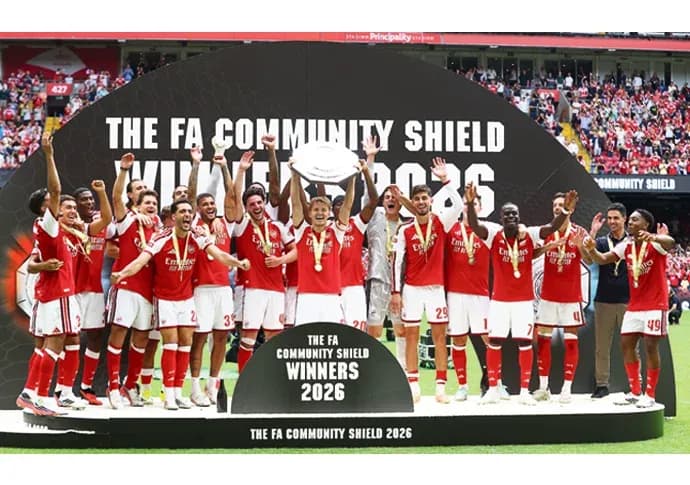 Jugadores de Arsenal celebrando la victoria en 2026 Jugadores de Arsenal celebrando la victoria en 2026