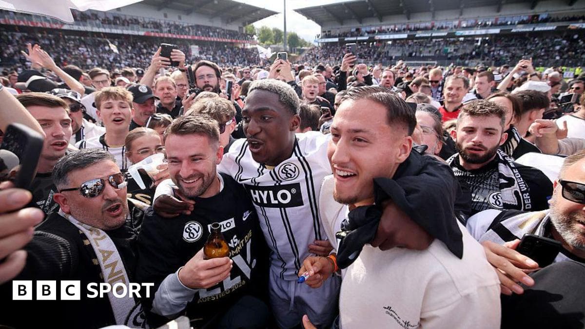 Celebration among fans and players after match Celebration among fans and players after match