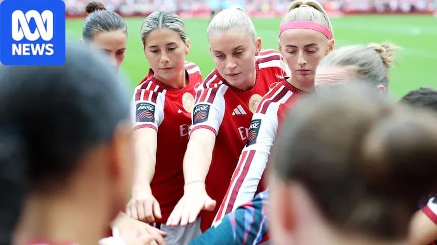 Jugadoras de fútbol en círculo antes del partido Jugadoras de fútbol en círculo antes del partido