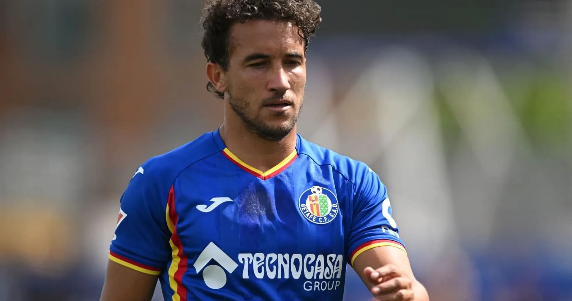 Jugador de Getafe en acción durante el partido Jugador de Getafe en acción durante el partido
