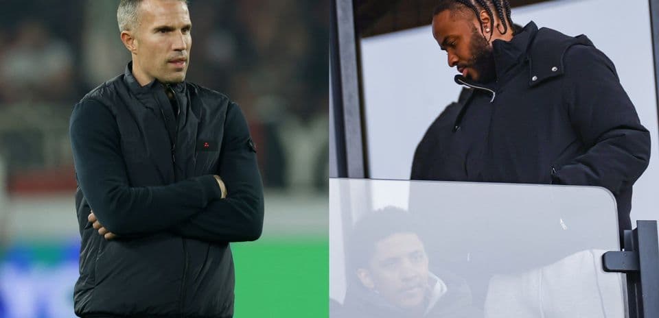 Entrenador y jugador observando el partido desde el palco Entrenador y jugador observando el partido desde el palco