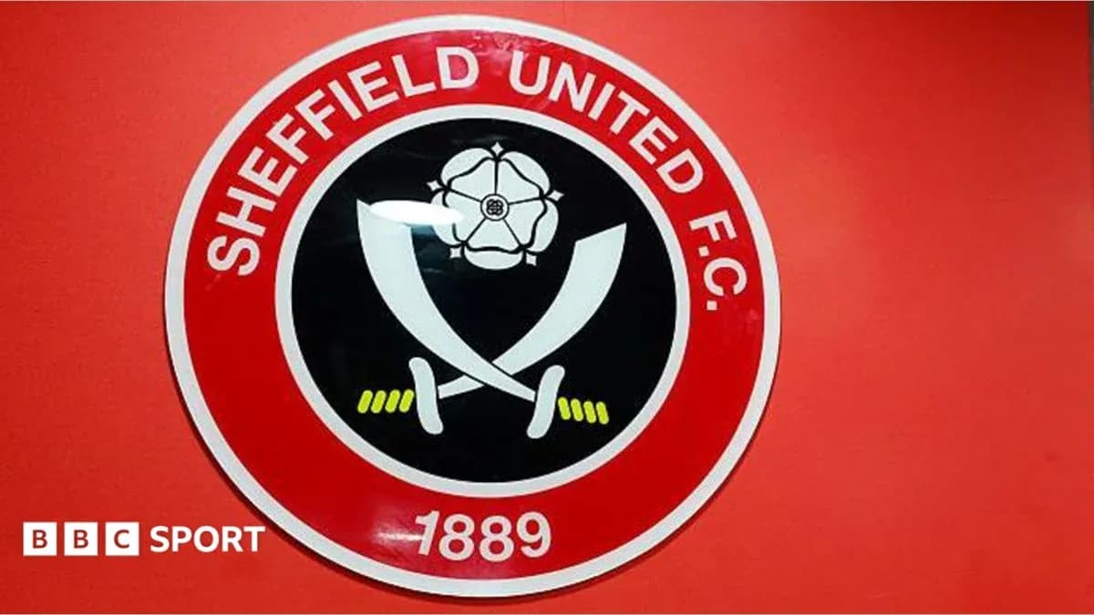 Escudo del Sheffield United F.C. en la pared Escudo del Sheffield United F.C. en la pared