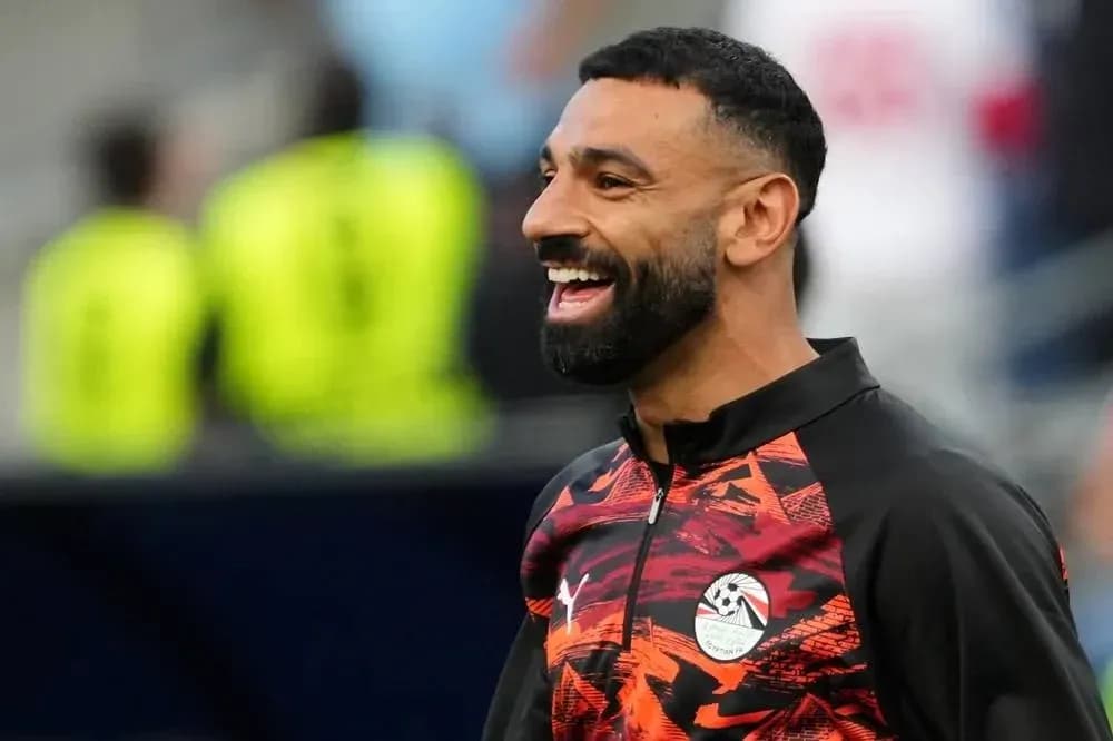 Jugador sonriendo durante el calentamiento previo al partido Jugador sonriendo durante el calentamiento previo al partido