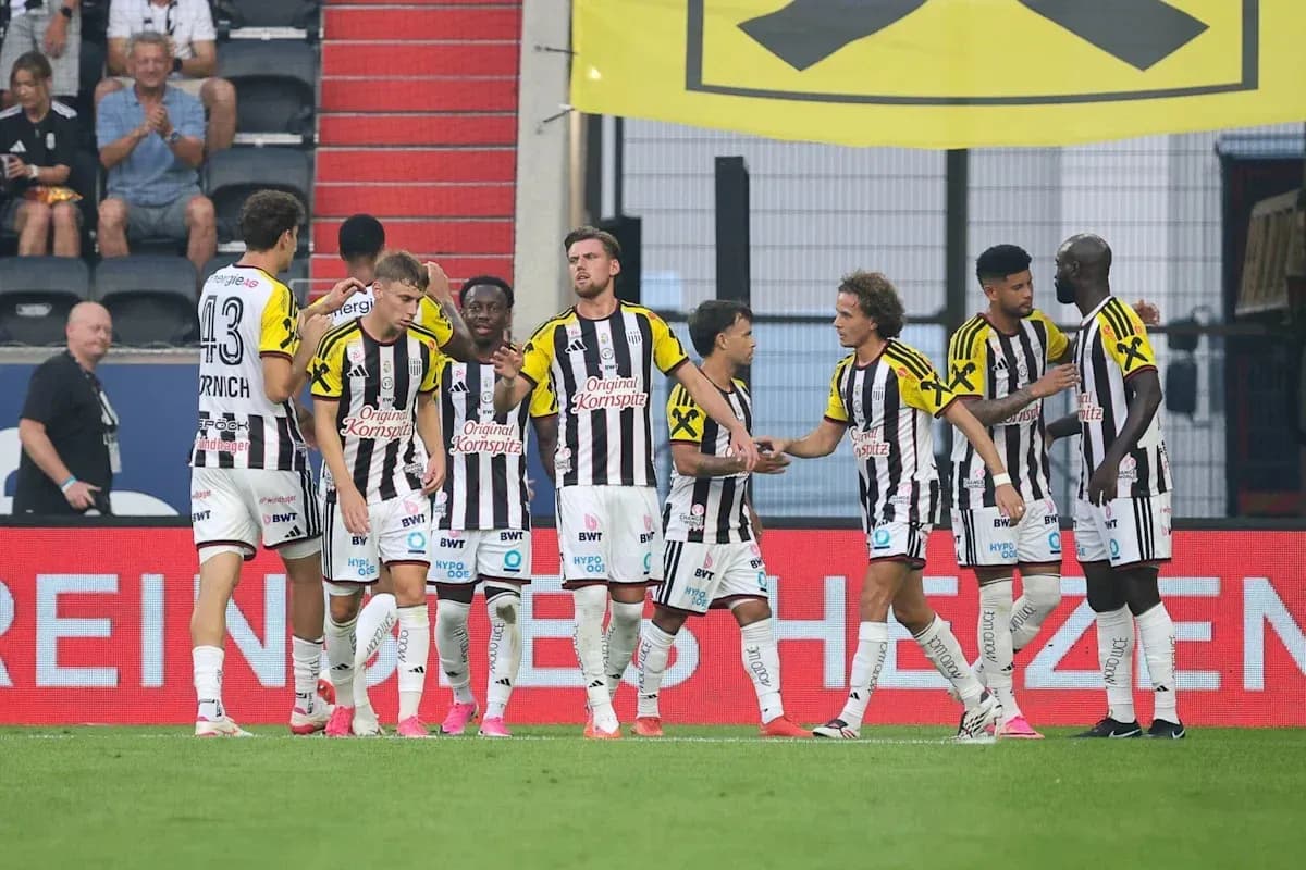 Jugadores de equipo celebrando un gol en el partido Jugadores de equipo celebrando un gol en el partido