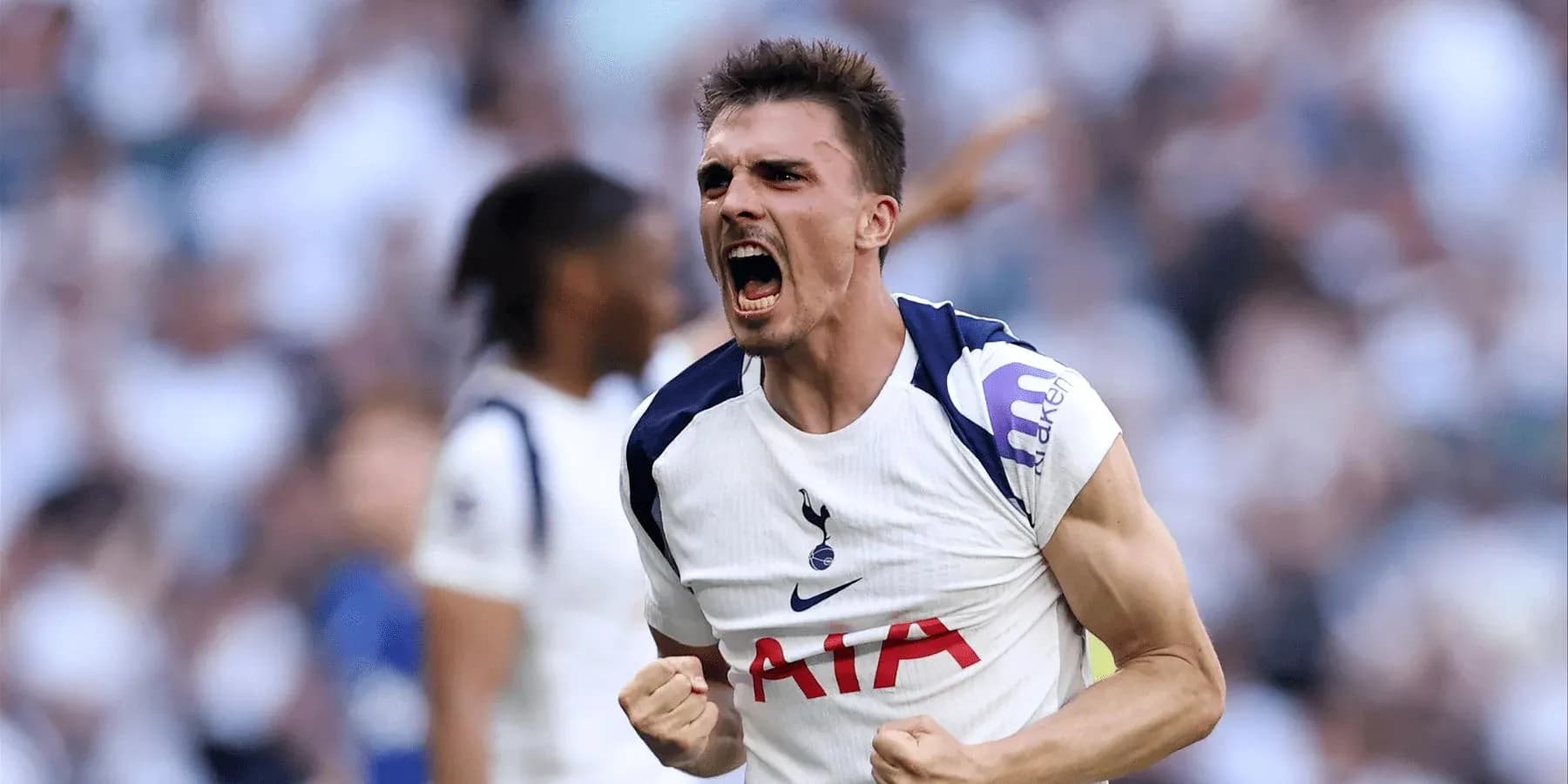 Jugador de Tottenham celebrando un gol Jugador de Tottenham celebrando un gol