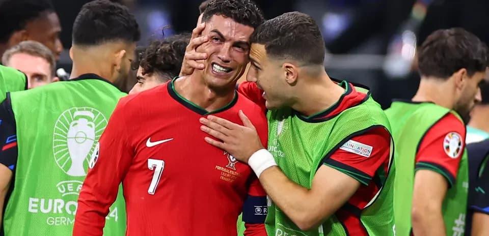 Cristiano Ronaldo emotional with teammate after match Cristiano Ronaldo emotional with teammate after match