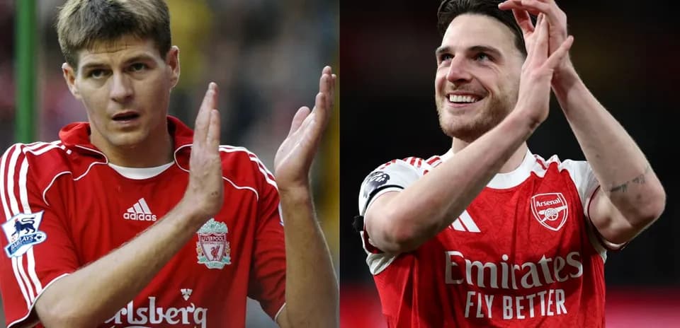 Jugadores aplaudiendo, uno de Liverpool y otro de Arsenal Jugadores aplaudiendo, uno de Liverpool y otro de Arsenal