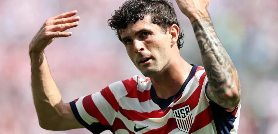 Jugador de la selección de EE. UU. gesticulando en el campo Jugador de la selección de EE. UU. gesticulando en el campo