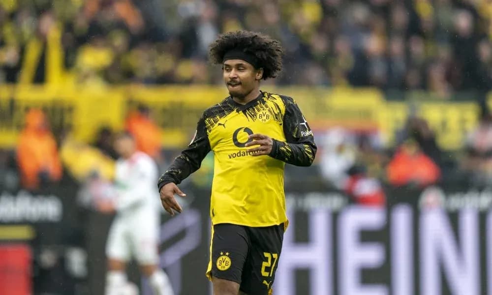 Jugador de Borussia Dortmund en acción durante el partido Jugador de Borussia Dortmund en acción durante el partido