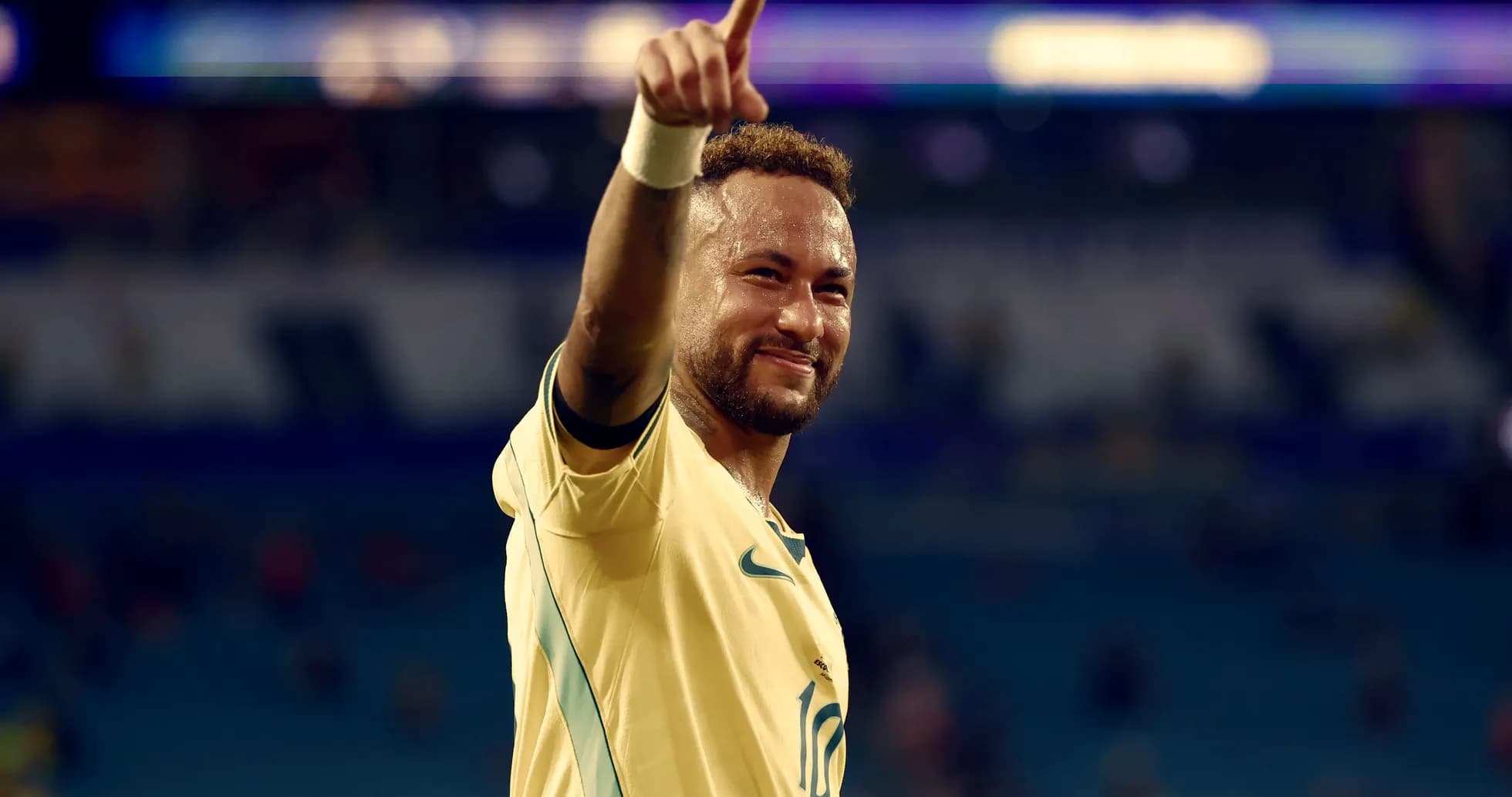 Jugador celebrando con el dedo apuntando hacia arriba Jugador celebrando con el dedo apuntando hacia arriba