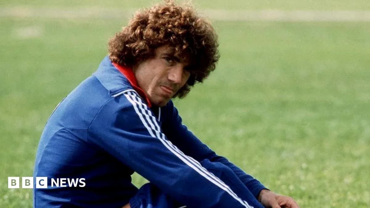 Jugador sentado en el campo de entrenamiento Jugador sentado en el campo de entrenamiento